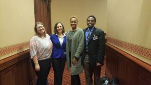 (From left) Lindsey Hammond of Community Renewal Society, Sam Tuttle from Heartland Alliance, State Rep. Camille Lilly, and CCH's Jonathan Holmes (Photo by CRS)