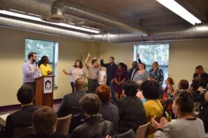 Senior Organizer Jim Picchetti honors some of the State Network's leaders during a victory celebration Oct. 20. (Photo by Claire Sloss)