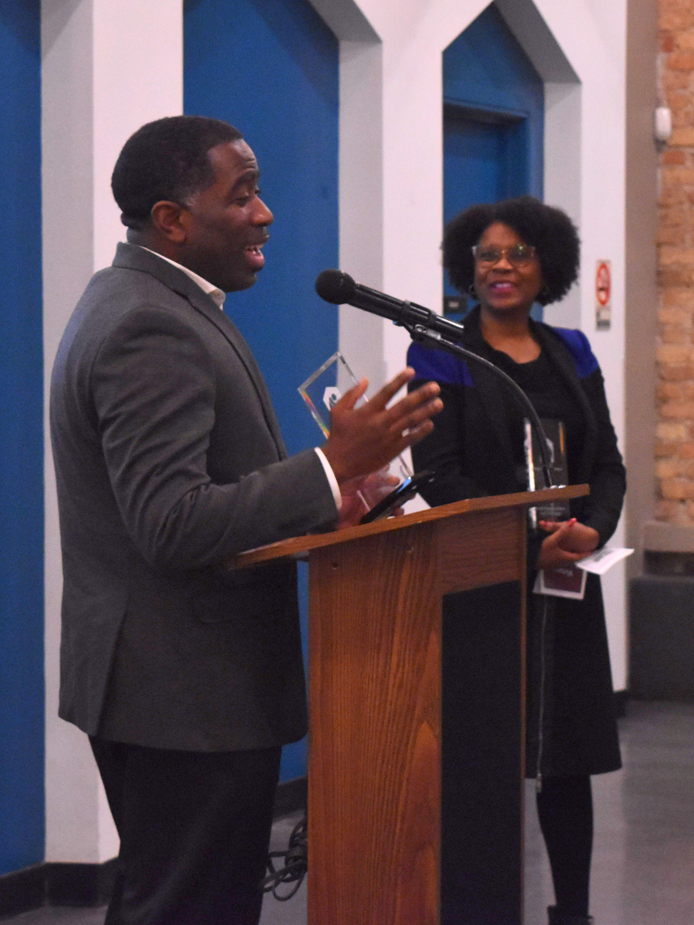 Rep. Marcus Evans & Sen. Adriane Johnson at podium