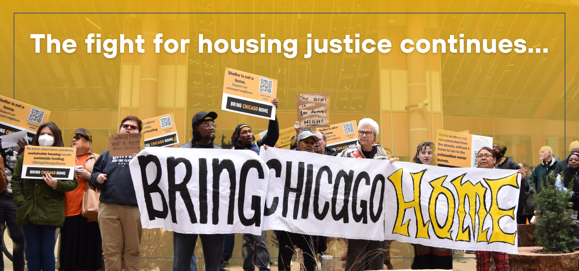 Group of people in front of city hall hold a sign in support of Bring Chicago Home campaign