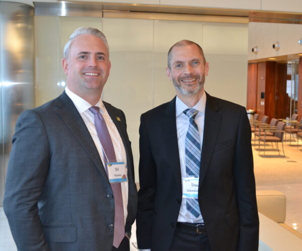 CCH Executive Director Doug Schenkelberg (right) is happy to welcome sponsor representative Bill Maloney of Fifth Third Bank.