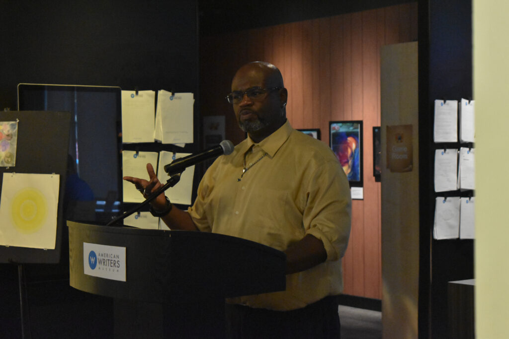 Chezeray Moore reads his poem.