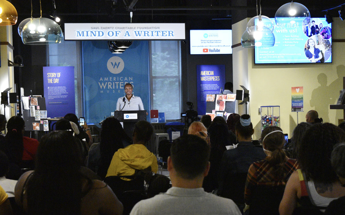 speaker at workshop in front of an audience