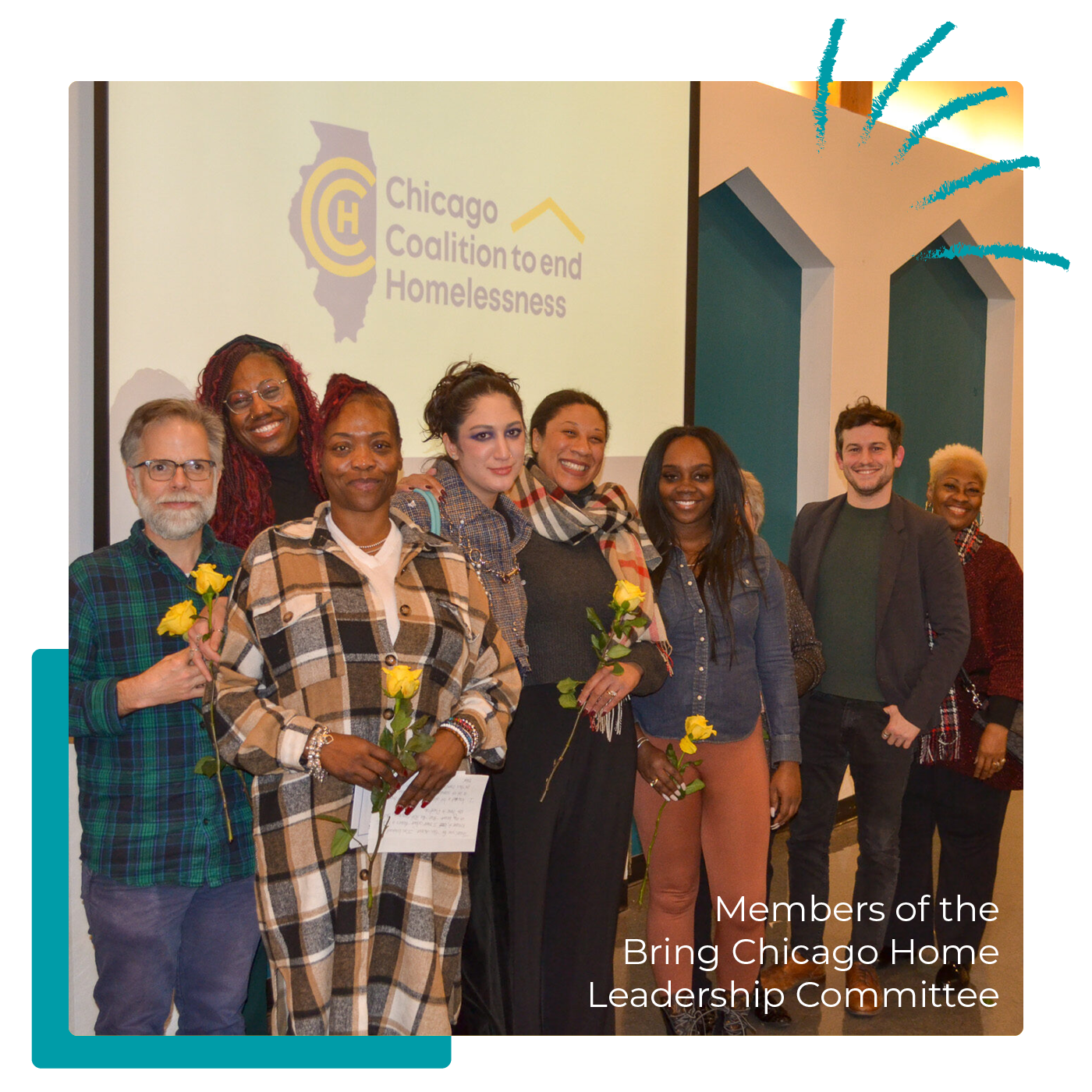 Members of the Bring Chicago Home Leadership Committee pose for a photo holding yellow roses.